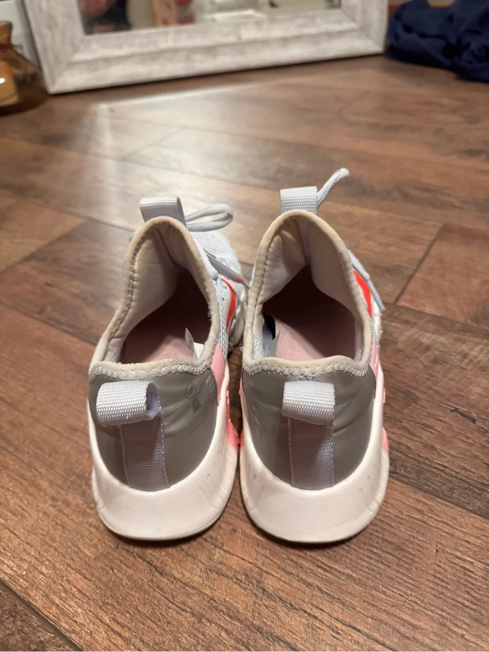 Nike Gray Athletic Sneakers with Bright Red Swoosh and Pink Accents